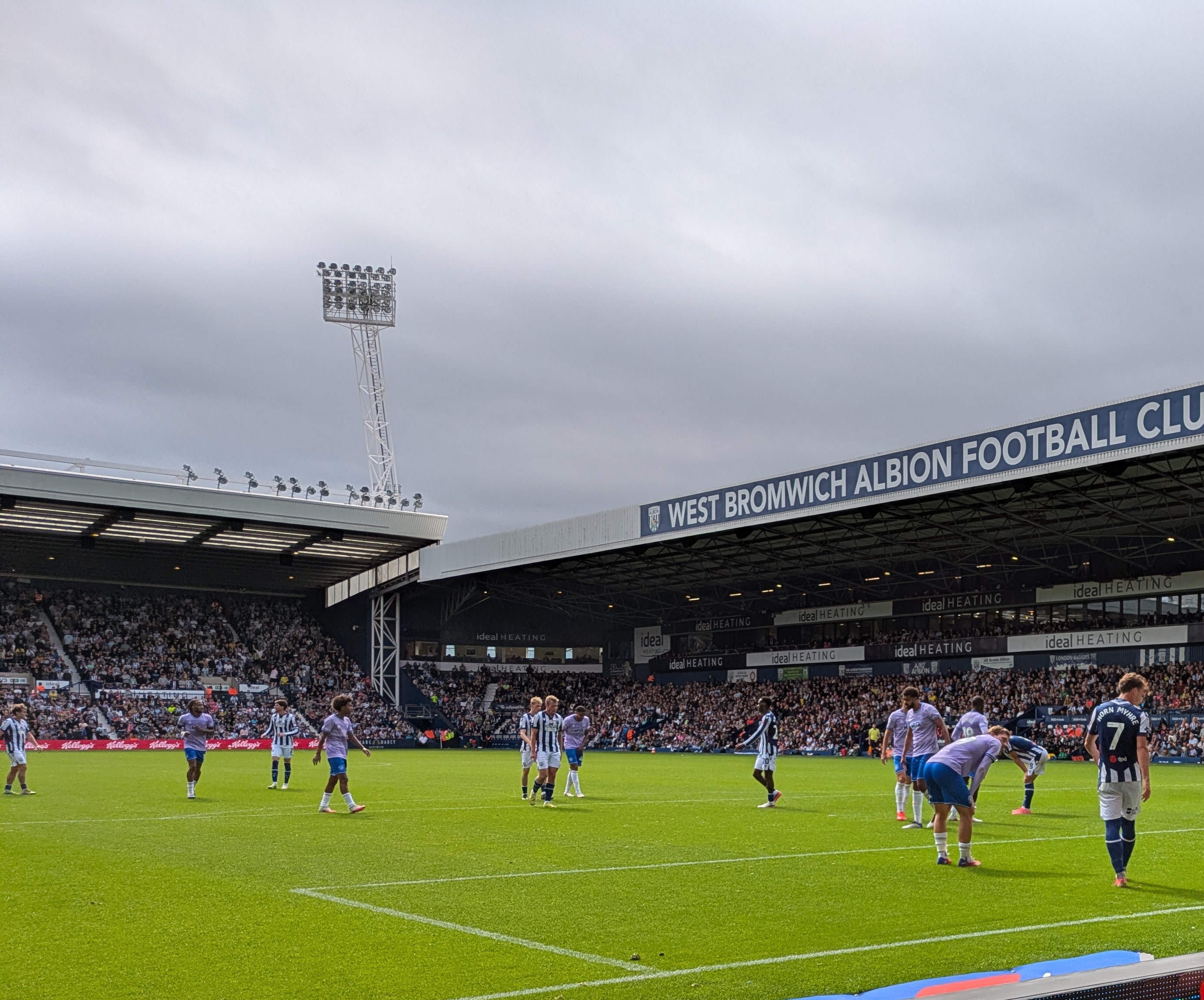 Match action against QPR under the West Bromwich Albion Football Club stand