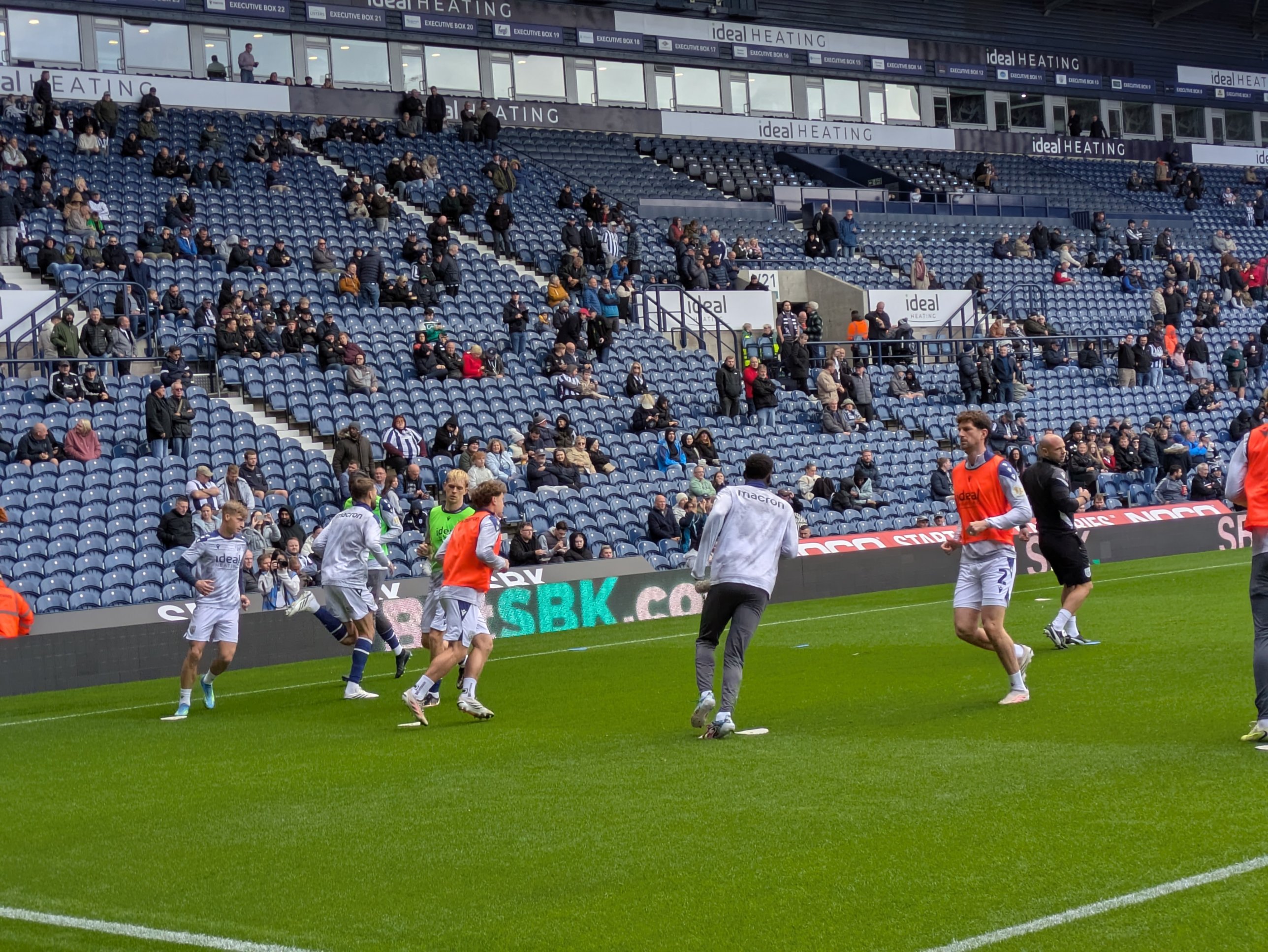 West Brom players warming up in bibs at The Hawthorns before Birmingham City