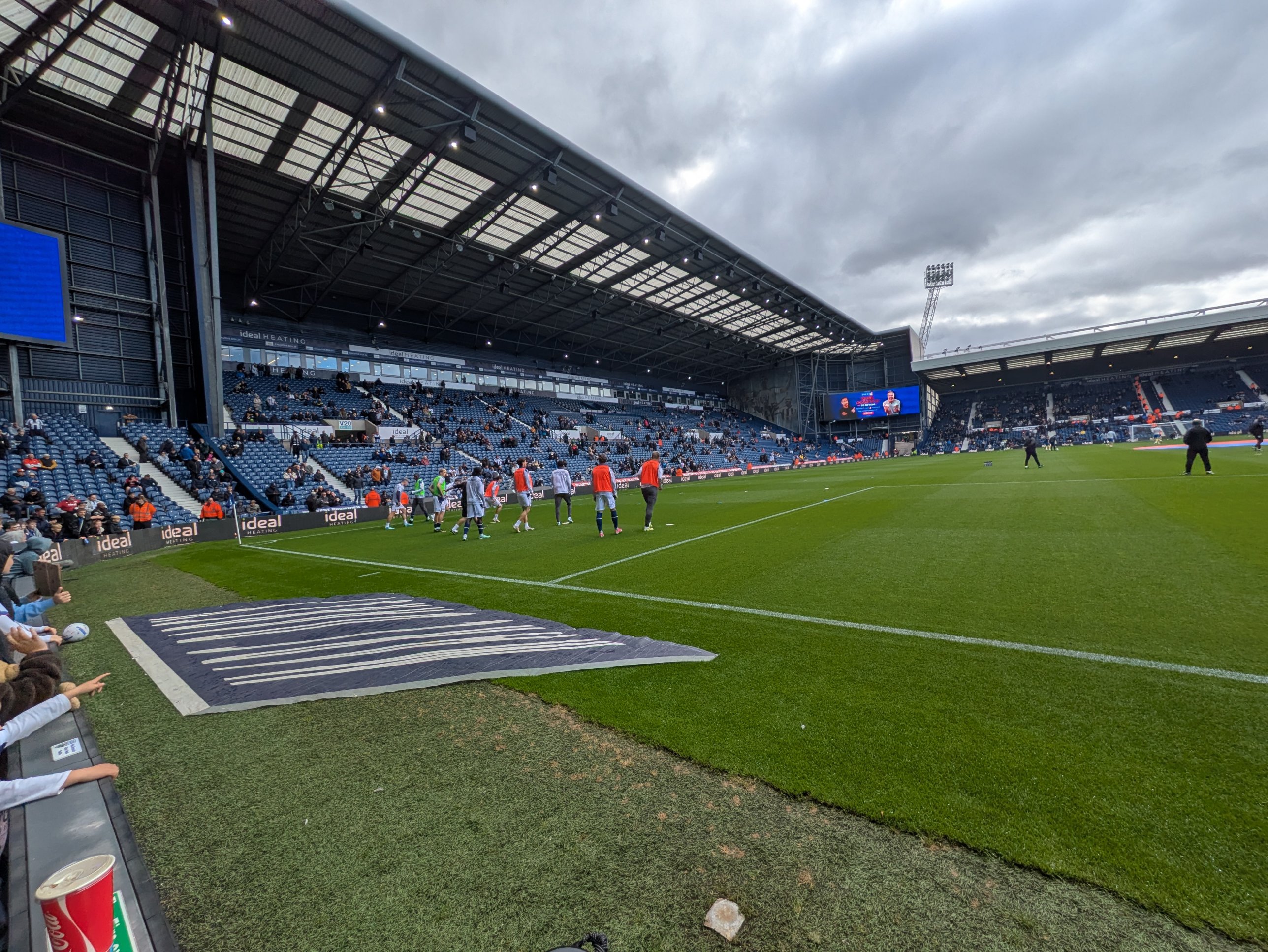 West Brom starting eleven warming up pitchside against Birmingham City